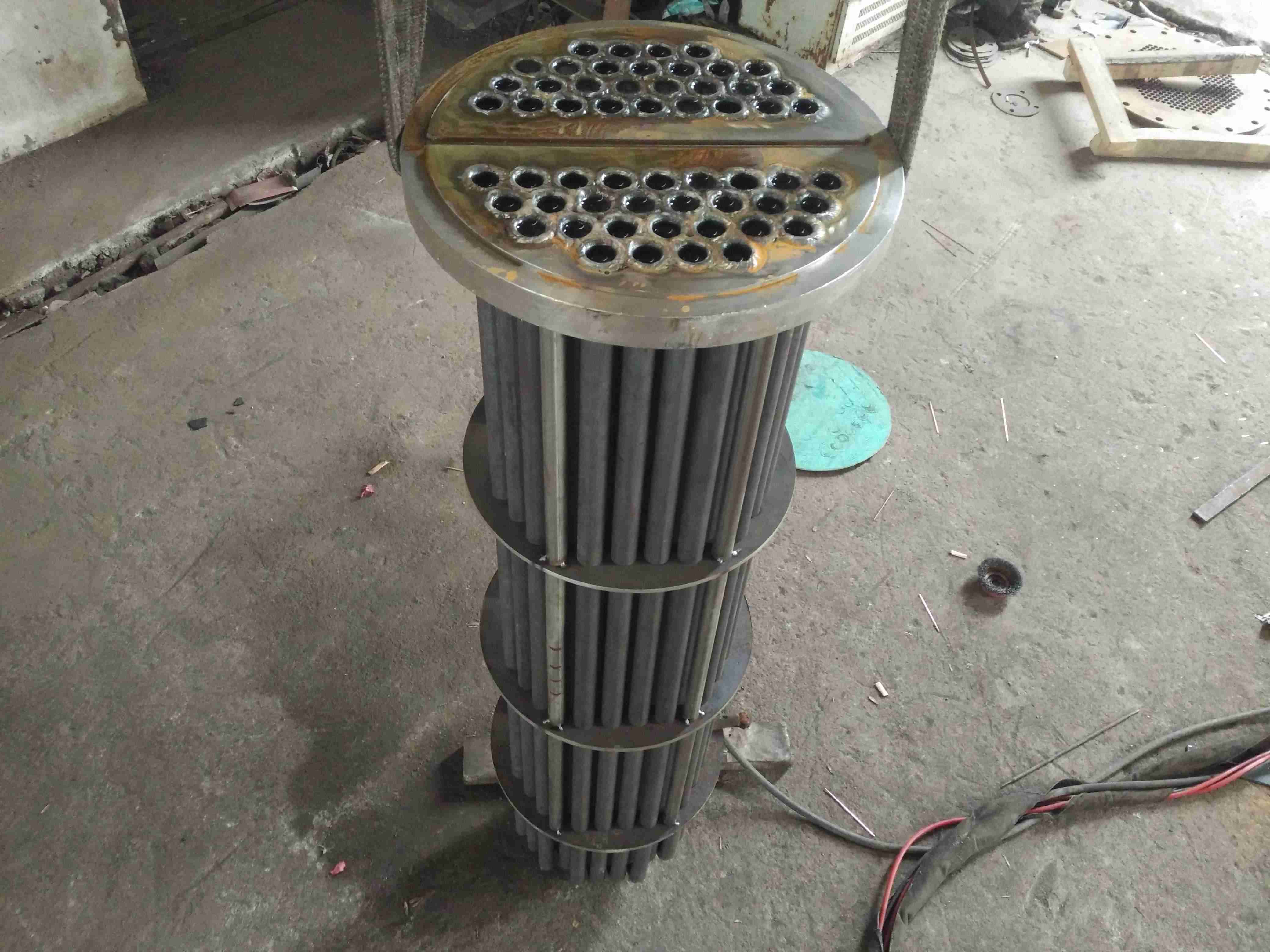 Positive displacement heat exchanger tube exchange